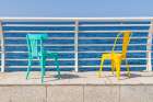 Saudi Arabia, Mecca Province, Jeddah. Colorful chairs on the waterfront of Jeddah. Art Print